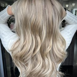 Studio 7 - Here's a full head of buttery blonde highlights with bright ends that look like they've been kissed by the sun.
