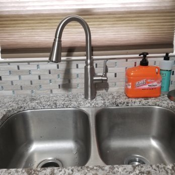 Devoted Plumbing - New kitchen faucet looks great with the stainless sink and tile backsplash! - Plumbing Near Me