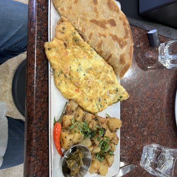 The Bistro - The Desi platter. The bread item was tasty, and the pickle very interesting - Bistros Near Me - Langley, British Columbia