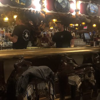 Million Dollar Cowboy Bar - Saddle barstool. - Bars Near Me - Jackson, Wyoming
