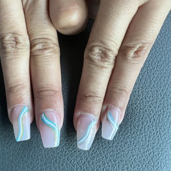 Cute-Icle Nails & Spa - Two of the "fixed" nails are clearly different colors and shapes as the others. They used green instead of gold like the rest. - Nail Salons Near Me - Surprise, Arizona