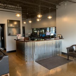Vaupell Auto Repair - Remodeled Comfy Waiting Room With Complementary Beverages, Free Wifi, 65" HD Cable & Comfy Chairs.