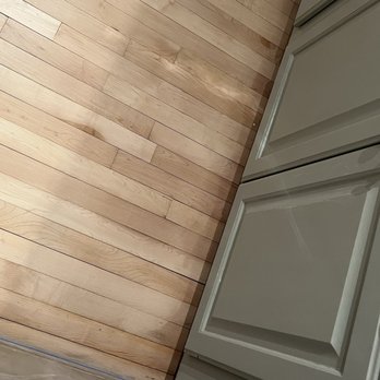 Dave's Master Floor Care - Splotchy sanding incomplete under cabinets - Refinishing Services Near Me - Burnsville, Minnesota Dave's Master Floor Care - Splotchy sanding incomplete under cabinets - Refinishing Services Near Me - Burnsville, Minnesota