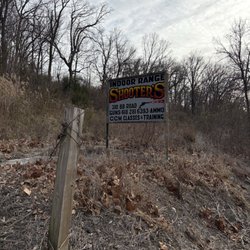 Shooter's Firearms And Indoor Gun Range - Directional sign on Old Hwy 3