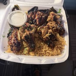 Grilled Chicken wings over rice