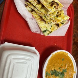 Garlic Naan, Chicken Tikka Masala, buttered/herb rice -- I love dipping the naan in the masala gravy. Wonderful flavors and a ton of food! Garlic Naan, Chicken Tikka Masala, buttered/herb rice -- I love dipping the naan in the masala gravy. Wonderful flavors and a ton of food!