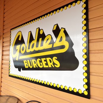 Goldie's Burgers - a sign for a restaurant - Salad Near Me - Gainesville, Florida