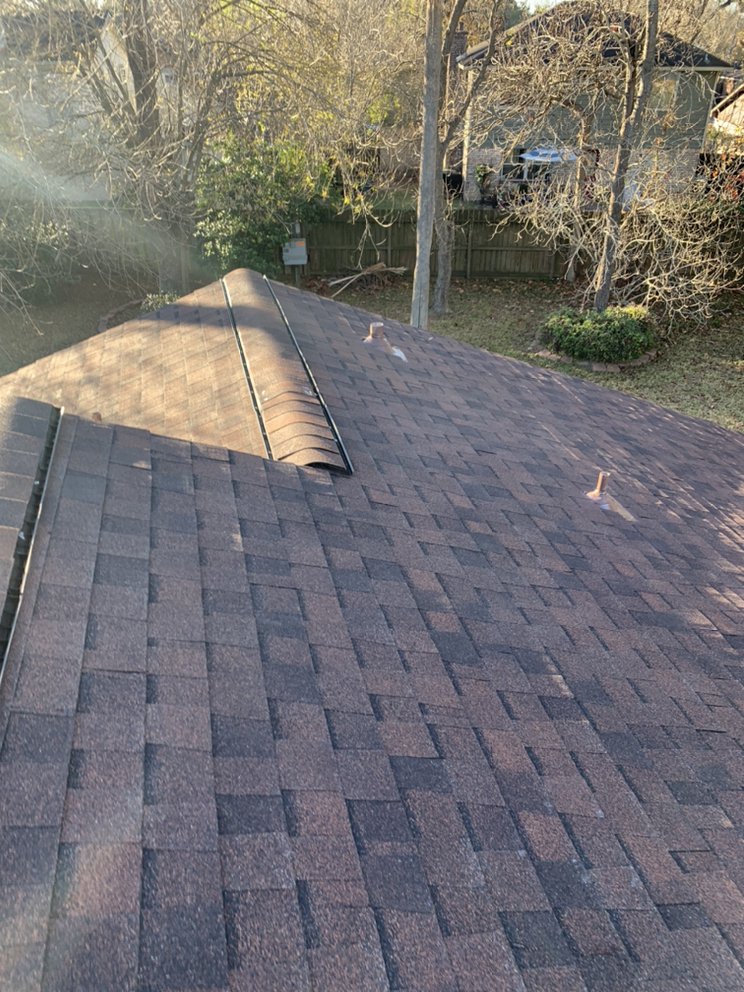 Slide of White Star Roofing