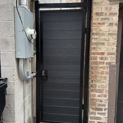 KG Doors & Gates - Custom built pedestrian with keypad . This gate was built out of steel tubing with high end synthetic wood.