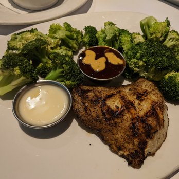Bonefish Grill - Sublime grilled Chilean sea bass with two servings of broccoli, lemon butter and pan-Asian sauces. - Seafood Near Me - Novi, Michigan Bonefish Grill - Sublime grilled Chilean sea bass with two servings of broccoli, lemon butter and pan-Asian sauces. - Seafood Near Me - Novi, Michigan