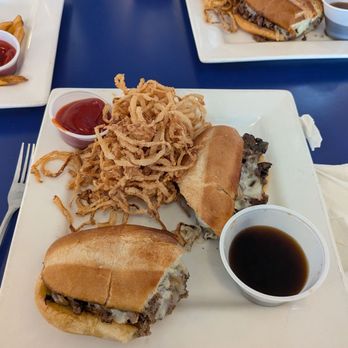 BaCalls Cafe - Cheese steak au jus with onion straws - New American Near Me - Cincinnati, Ohio