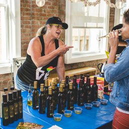 Janelle offering olive oil tastings at our Rainbow Bazaar Janelle offering olive oil tastings at our Rainbow Bazaar