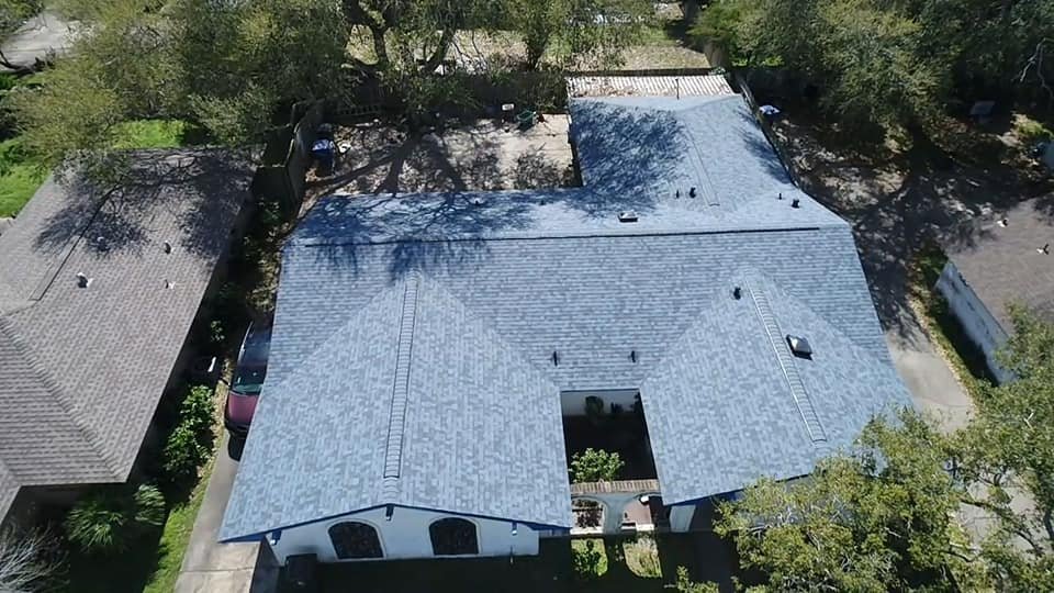 Slide of Vasquez Roofing Company