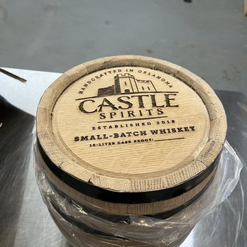 Castle Spirits Distillery - a jar of whiskey on a table - Distilleries Near Me - Oklahoma City, Oklahoma Castle Spirits Distillery - a jar of whiskey on a table - Distilleries Near Me - Oklahoma City, Oklahoma