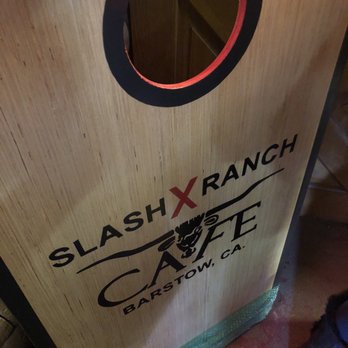 Slash X Ranch Cafe - I loved the Slash X Ranch cornhole game but $250 was a little too much. - American Near Me - Barstow, California