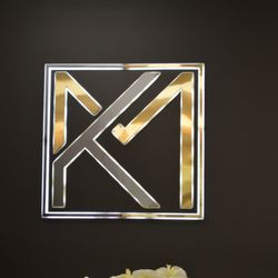 Kat Motlagh's Health Clinics - Logo