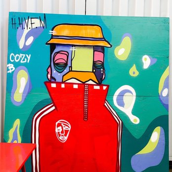Ironworks HTX - a painting of a man wearing a helmet - Coffee & Tea Near Me - Houston, Texas