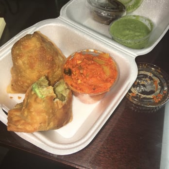 Kerala Kitchen - Veggie samosa with chutney and pickled lime - Indian Near Me - Lawrenceville, Georgia Kerala Kitchen - Veggie samosa with chutney and pickled lime - Indian Near Me - Lawrenceville, Georgia