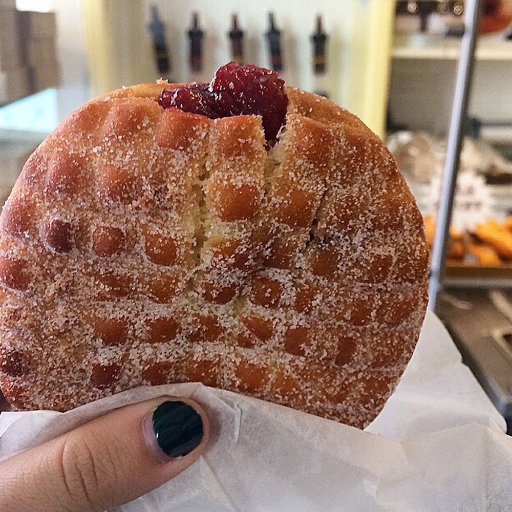 Orwashers - Freshly filled donut with strawberry jelly. See the jelly syringes in the background - Bakeries Near Me - New York, New York Orwashers - Freshly filled donut with strawberry jelly. See the jelly syringes in the background - Bakeries Near Me - New York, New York