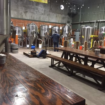 Cerveceria Wendlandt - Tables infront of the brewery tanks. Fun to watch them brew! - Gastropubs Near Me - Ensenada, BCN