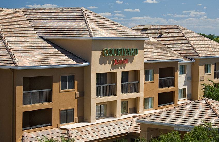 Slide of Boss Roofing Experts