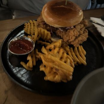 The Brick Kitchen + Lounge - Fried chicken sandwich with seasoned waffle fries. - Beer Bar Near Me - Renton, Washington The Brick Kitchen + Lounge - Fried chicken sandwich with seasoned waffle fries. - Beer Bar Near Me - Renton, Washington