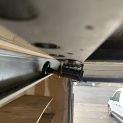 Anchor Garage Service - Heavy doors put a lot of load on the rollers. These are all that is holding the door up while it's overhead.