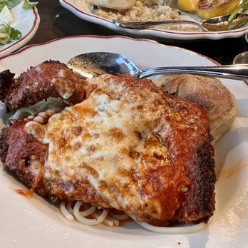 Tony C's - Chicken Parmesan very burnt on the ends. Not so pretty presentation. - Pizza Near Me - Austin, Texas Tony C's - Chicken Parmesan very burnt on the ends. Not so pretty presentation. - Pizza Near Me - Austin, Texas
