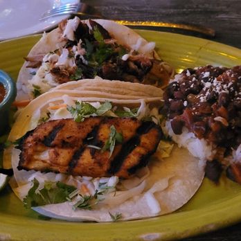 Hula's Island Grill - Beans over rice, one fish taco and one Kalyan pork taco. It was very good but the fish taco was a little bland. - Asian Fusion Near Me - Monterey, California Hula's Island Grill - Beans over rice, one fish taco and one Kalyan pork taco. It was very good but the fish taco was a little bland. - Asian Fusion Near Me - Monterey, California
