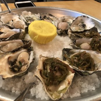 Salt  - Grilled Oysters, some with lemon garlic sauce, some with a spiced radish sauce, and some with a Vietnamese fish sauce. - Seafood Near Me - Arcata, California