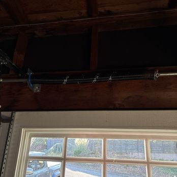 Advanced Garage Doors - Newly installed garage door spring. No need to lubricate, comes already lubricated. - Garage Door Services Near Me - Portland, Oregon Advanced Garage Doors - Newly installed garage door spring. No need to lubricate, comes already lubricated. - Garage Door Services Near Me - Portland, Oregon