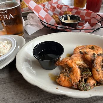 Tanners Lakeside - a plate of fried shrimp with a side of coleslaw - Bars Near Me - Winter Haven, Florida Tanners Lakeside - a plate of fried shrimp with a side of coleslaw - Bars Near Me - Winter Haven, Florida