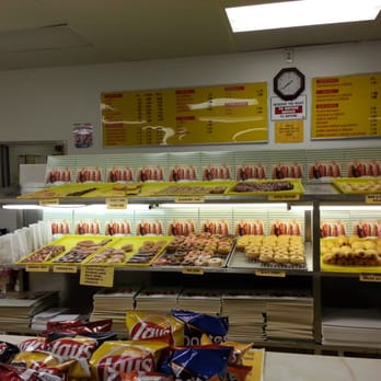 Donut Hole - a variety of donuts in a display case - American Near Me - Houston, Texas