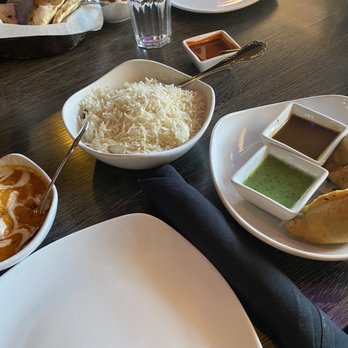 Haldi Indian Cuisine - Chicken Tikka Masala with Basmati Rice and Vegetable Samosas, plus hot sauce - Indian Near Me - Glendale, Arizona Haldi Indian Cuisine - Chicken Tikka Masala with Basmati Rice and Vegetable Samosas, plus hot sauce - Indian Near Me - Glendale, Arizona