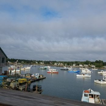 Thurston's Lobster Pound - The view from our seats on the deck. All the lobster boats. - Seafood Near Me - Bernard, Maine Thurston's Lobster Pound - The view from our seats on the deck. All the lobster boats. - Seafood Near Me - Bernard, Maine