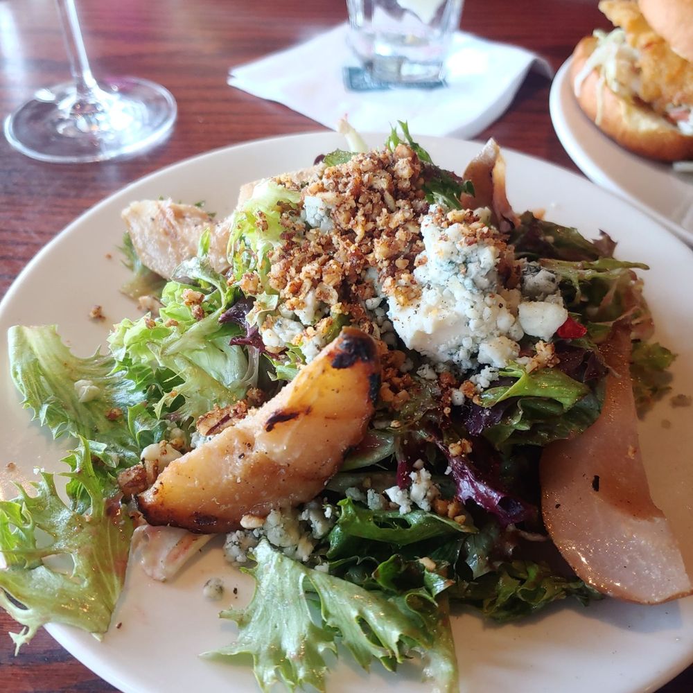 Zephyr Grill & Bar - Pear salad with crumbled nuts and bleu cheese and raspberry vinaigrette dressing. - American Near Me - Livermore, California Zephyr Grill & Bar - Pear salad with crumbled nuts and bleu cheese and raspberry vinaigrette dressing. - American Near Me - Livermore, California