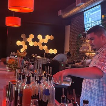 Moonlight Liquor Lounge - a bartender pouring a drink - Beer, Wine & Spirits Near Me - Fuquay-Varina, North Carolina Moonlight Liquor Lounge - a bartender pouring a drink - Beer, Wine & Spirits Near Me - Fuquay-Varina, North Carolina