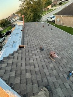 Slide of Archie's Roofing & Construction