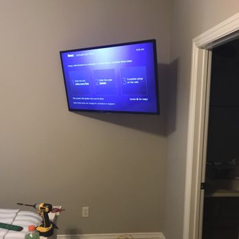 Reds PC and Technologies - 32" tv wall mounted with electrical plug added for a bedroom. - Data Recovery Near Me