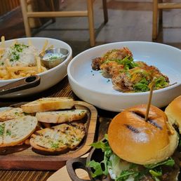 Happy hour: Fries, Wings; Chevre and guava jelly; Sliders Happy hour: Fries, Wings; Chevre and guava jelly; Sliders