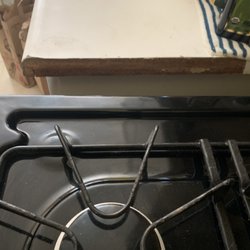 A & C Appliance - The side of counter should be white not brown. It was peeled off.