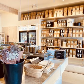Flourist - shelves of various types of flour in a store - Bakeries Near Me - Vancouver, British Columbia