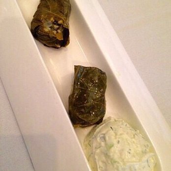 Nostos - Dolmadakia Yialantzi (grape leaves with tzatziki) - Greek Near Me - Vienna, Virginia Nostos - Dolmadakia Yialantzi (grape leaves with tzatziki) - Greek Near Me - Vienna, Virginia