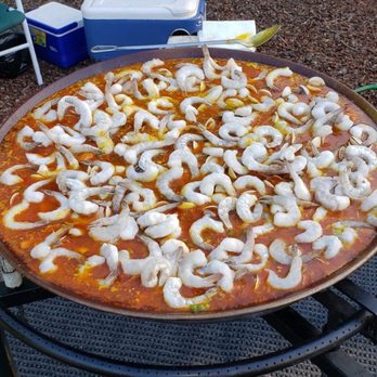 The Paella Man - a pizza with onions on it - Spanish Near Me The Paella Man - a pizza with onions on it - Spanish Near Me