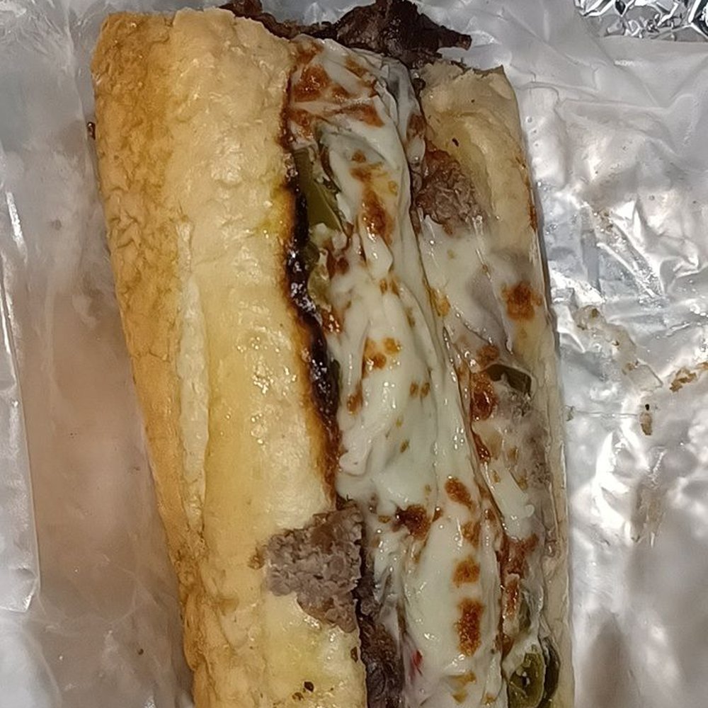 Triano's Pizza - Beef with peppers & motzerella - Pizza Near Me - Chicago, Illinois Triano's Pizza - Beef with peppers & motzerella - Pizza Near Me - Chicago, Illinois