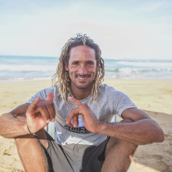 Surfing Puerto Rico - The man, Brian Ramos. Pro surfing champion and a Physical Ed teacher and cool guy. Has been surfing La Pared for 30 years. - Tours Near Me - Luquillo, Puerto Rico