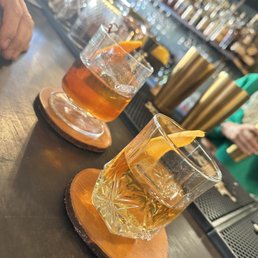 Angels Envy with a hint of orange and a beautifully crafted Old Fashioned. Angels Envy with a hint of orange and a beautifully crafted Old Fashioned.