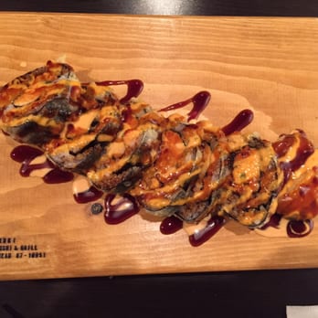 Kabuki Sushi and Grill - a wooden cutting board - Japanese Near Me - Edmonton, Alberta Kabuki Sushi and Grill - a wooden cutting board - Japanese Near Me - Edmonton, Alberta