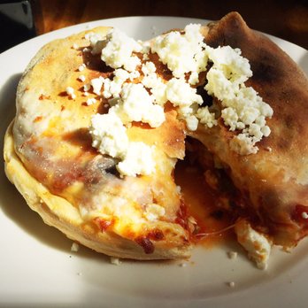 Cafe il Mondo - GREEK CALZONE: Kalamata olive,onions,artichoke,bell pepper,fresh mushrooms,marinara,feta, and mozzarella cheese. - Pizza Near Me - Honokaa, Hawaii Cafe il Mondo - GREEK CALZONE: Kalamata olive,onions,artichoke,bell pepper,fresh mushrooms,marinara,feta, and mozzarella cheese. - Pizza Near Me - Honokaa, Hawaii