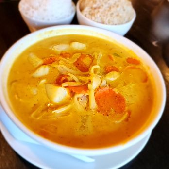 Thai Flavors Ingersoll - Yellow Curry with calamari & brown rice - Thai Near Me - Des Moines, Iowa Thai Flavors Ingersoll - Yellow Curry with calamari & brown rice - Thai Near Me - Des Moines, Iowa